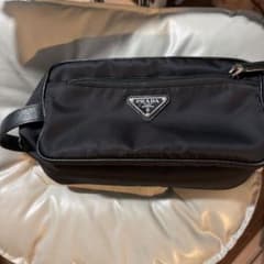 Prada clutch bag (second bag) purchased from an authorized retailer.