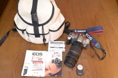 CANONカメラと長い300ｍｍレンズと純正バックとリモコンRC-5のサムネイル