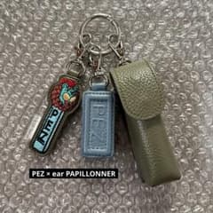PEZ × ear PAPILLONNER 本革リップケースチャーム - メルカリ