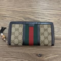 GUCCI グッチ GGキャンバス ウォレット 長財布 タッセルのサムネイル