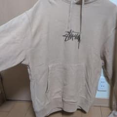 Stussy パーカー ベージュ Lサイズのサムネイル