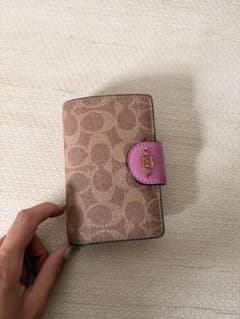 COACH 二つ折り財布 シグネチャー ピンクのサムネイル