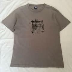 【90s】STUSSY フェード フロントロゴTシャツ L ビンテージのサムネイル