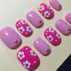 パステルピンク×デイジー柄ネイルのサムネイル