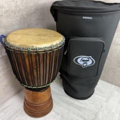中古良品】ジャンベ DJEMBE 木製 民族楽器 ケース付き - メルカリ