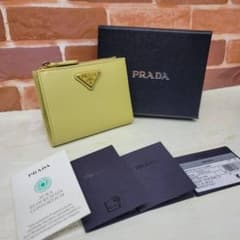 ほぼ未使用PRADA☆鑑定済☆CITY CALF TAB イエロー プラダ財布 - メルカリ