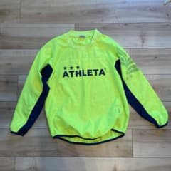 ATHLETA ピステ ウィンドブレーカー 蛍光イエロー150 - メルカリ