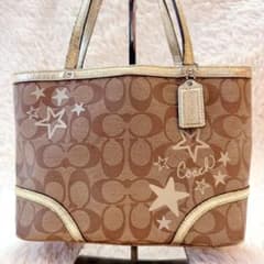COACH コーチ ミニバッグ シグネチャー 星柄 ゴールド - メルカリ