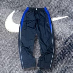 00s y2k NIKE ワイドナイロンパンツ 裾ジップ 刺繍ロゴ サイドライン