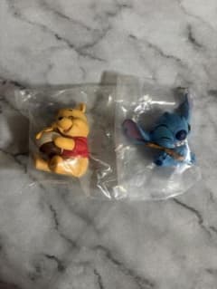 ディズニー】むぎゅっと まとめ売り スティッチ プーさん カプセルトイ