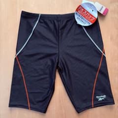 Brand new Reebok men's swim trunks, black, size L.