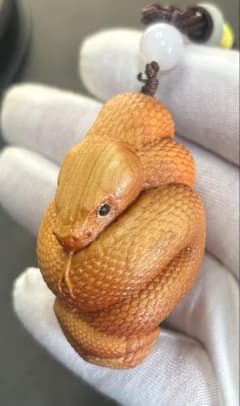 Unused, finely carved wooden snake. Antique art, fine art, lucky charm, amulet, wood carving, feng shui, good fortune, luck.