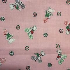 Rare and hard-to-find 1930s vintage fabric with a cute bicycle bear pattern.