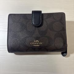 COACH シグネチャー 二つ折り財布のサムネイル