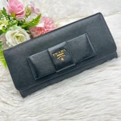PRADA 長財布 サフィアーノ フィオッコ リボン 黒 - メルカリ