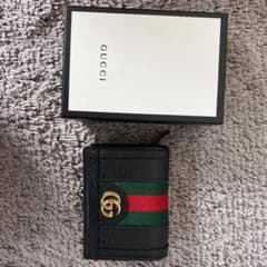 GUCCI 折りたたみ財布GG カードケース(コイン＆紙幣入れ付き)のサムネイル