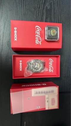 新品未使用G-SHOCK × Coca-Cola GA-2100CC-3AJRのサムネイル
