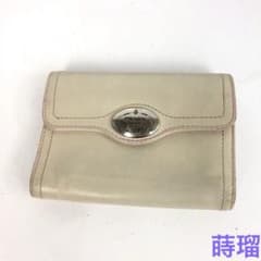 PRADA プラダ 三つ折り財布 コンパクトウォレット ロゴ プレート レザーのサムネイル