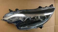 日産 E12 ノート  左ヘッドライトのサムネイル