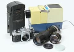 Canon AE-1 一眼レフカメラ レンズ2本 & Slidestar 300 - メルカリ