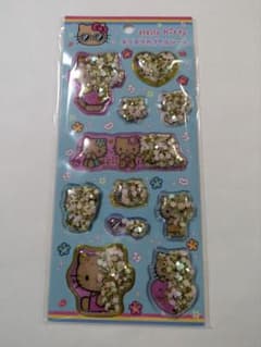 【正規品】Hello Kitty キラキラカプセルシール　日焼け柄のサムネイル