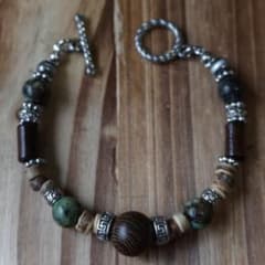 Indian jewelry, wood beads, stainless steel, vintage style, American casual.