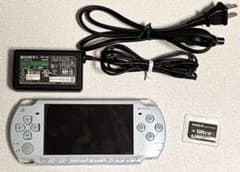 PSP-2000FB console with AC adapter and 4GB Memory Stick.