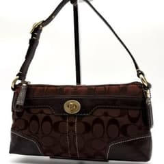 コーチ　アクセサリーポーチ シグネチャー ターンロック ブラウン 11057 COACH アクセサリーポーチ シグネチャー ターンロック ブラウン 11057