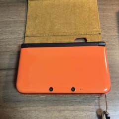【値下げしました】ニンテンドー3DS LL オレンジ　ブラックのサムネイル