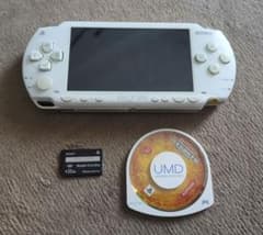 Sony PSP1000 game console with 32GB Memory Stick and games included.