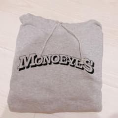 【新品】MONOEYES グッズ M フーディー プルオーバー パーカー グレー 新品】MONOEYES グッズ M フーディー プルオーバー パーカー グレー