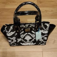 ジーザスディアマンテ ロマンスドールバッグ エンジェル柄黒 - メルカリ