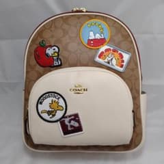 新品未使用】COACH コーチ ススヌーピーコラボリュック - メルカリ