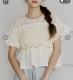 OLUN】shirring frill top/シャーリングフリルトップス - メルカリ