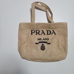PRADA かごバッグ トートバッグ ベージュノベルティ - メルカリ