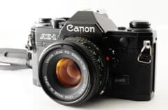 キャノン Canon AE-1 ブラック + NEW FD 50mm F1.8 - メルカリ