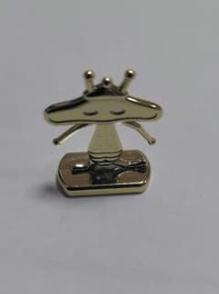 イ*い様 フエラムネのおまけの金メッキのペラ怪獣のサムネイル