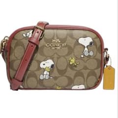 美品✨COACH ×PEANUTSミニジェイミーカメラバッグ - メルカリ