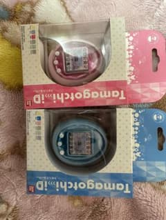 たまごっちid 新品 ピンク 水色 バンダイ - メルカリ