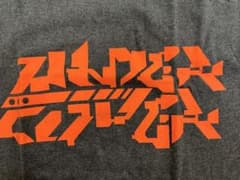 UNDERCOVER オレンジグラフィックTシャツ スケシンデザインT Ｌのサムネイル