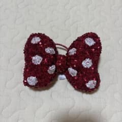 Disney hair tie with ribbon, sequins, and polka dots.