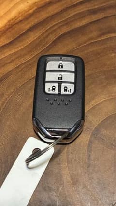 ホンダ純正　スマートキー　両側スライド　新品未使用　フリードのサムネイル