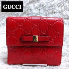 ❤良品❤GUCCIグッチ 折り財布 シマレザー リボン インターロッキングG