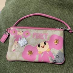 Coach Poppy Chan Pinky wristlet - メルカリ