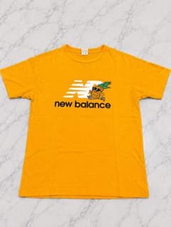 New Balance ニューバランス Tシャツ オレンジ パイナップルロゴ Sのサムネイル