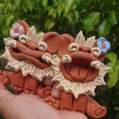 笑顔のほのぼの赤白シーサーのサムネイル