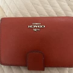 COACH 二つ折り財布 オレンジのサムネイル