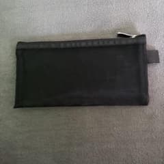 Black passport case, pouch, wallet, small bag, accessory case, pencil case, travel bag, etc.