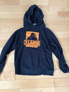 X-LARGEパーカー黒 ロゴオレンジ Mサイズ 最終値下げのサムネイル