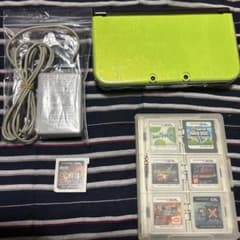 NEW Nintendo3DSLL ライムxブラック、充電器、ソフト7本、ケースのサムネイル